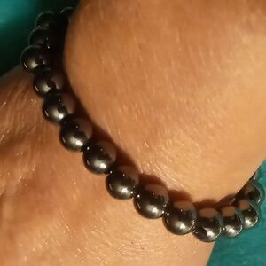 Hermitite genuine beaded hermitite expandable bracelet.